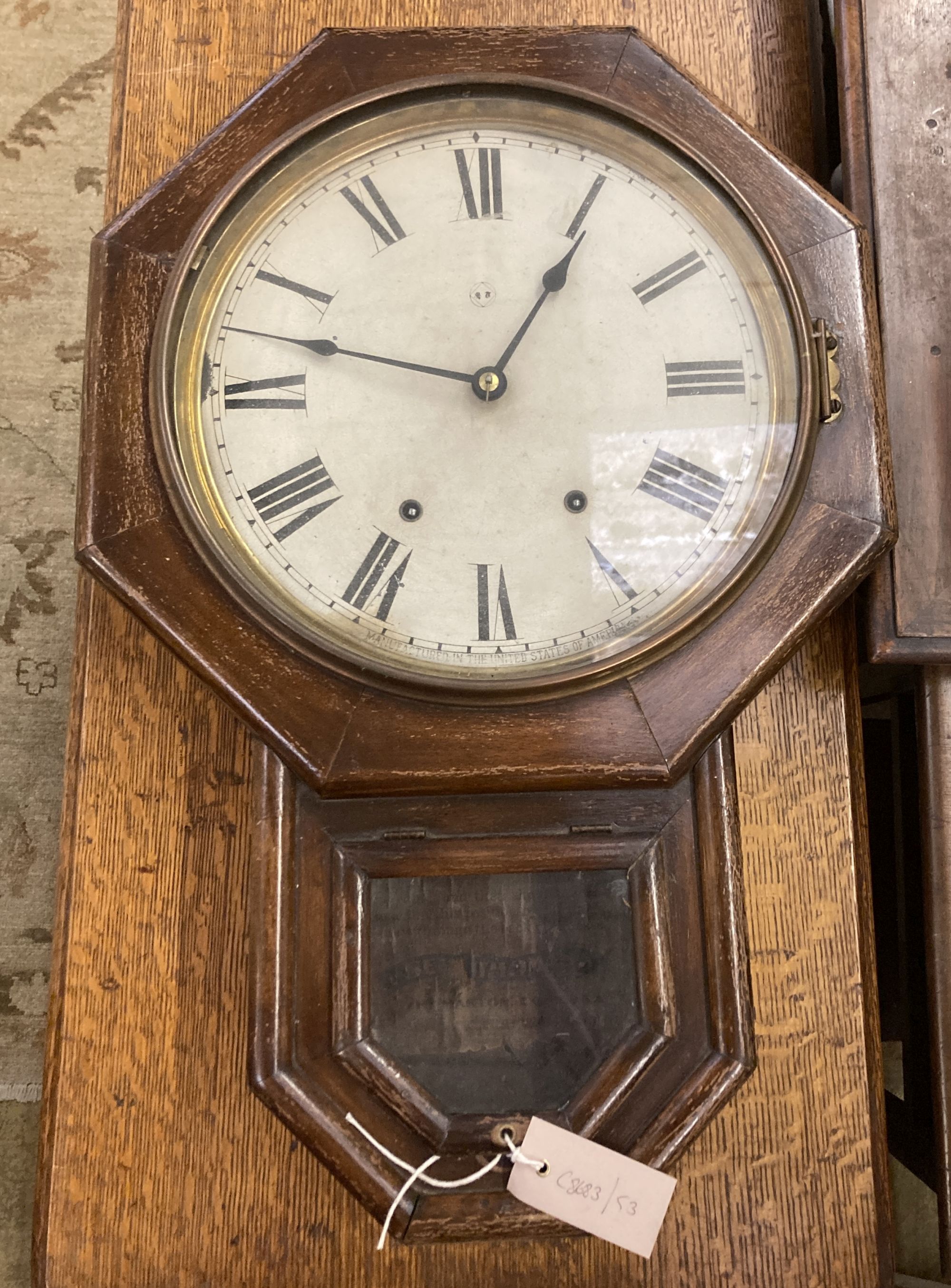 A Victorian mahogany eight day drop dial wall clock, with octagonal dial, height 60cm